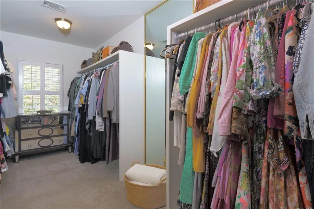Primary Walk in Spacious Double Closet