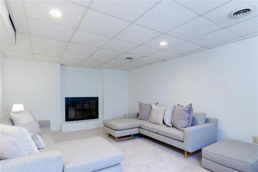 Spacious Terrace Level Rec Room/ Media/Rec Room/ Game Room/ 6th Bedroom with Fireplace- You decide!