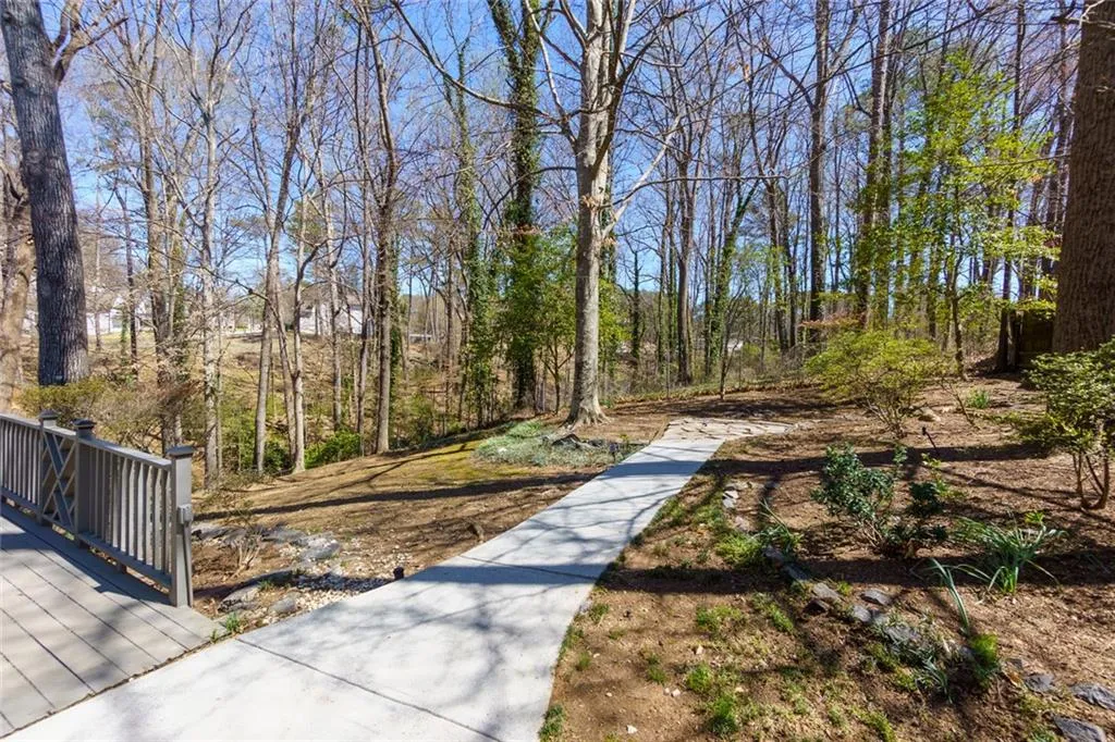 Back Yard Leading to Stone Fire Pit