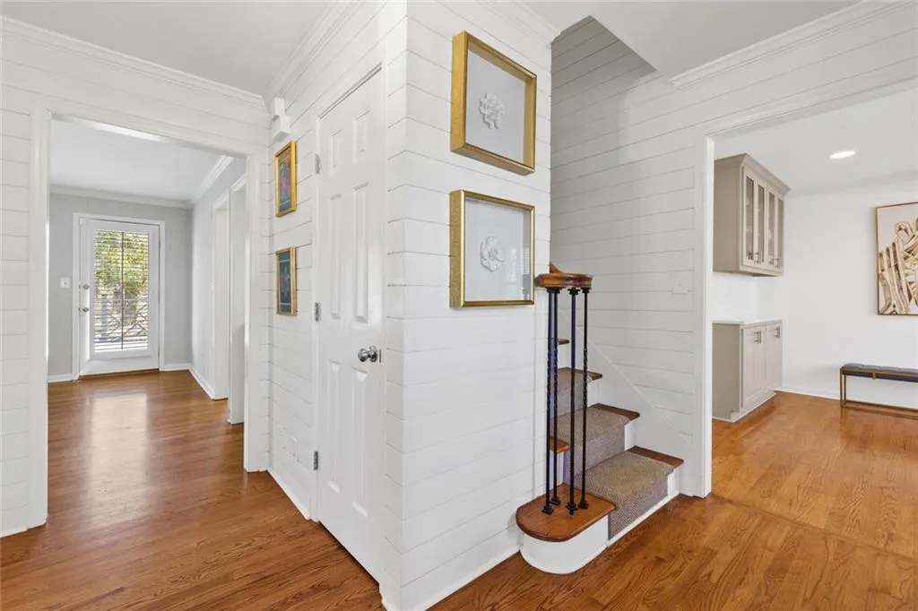 Entry Foyer with view of Dining Room to your Right and Hallway to the Left.