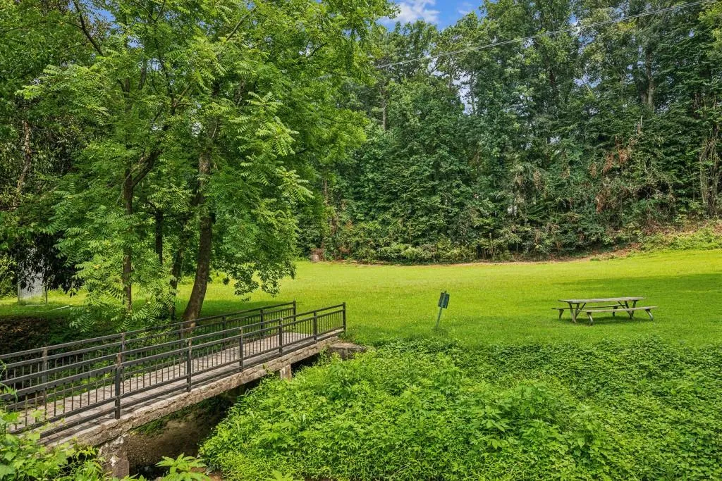 Playing fields adjacent to the park and playground. There are also picnic tables and a Little Free Library.