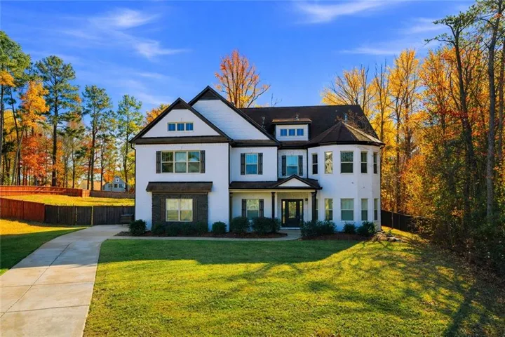 View of front of house with stucco siding