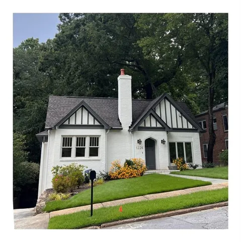 White brick exterior with dark trim accents