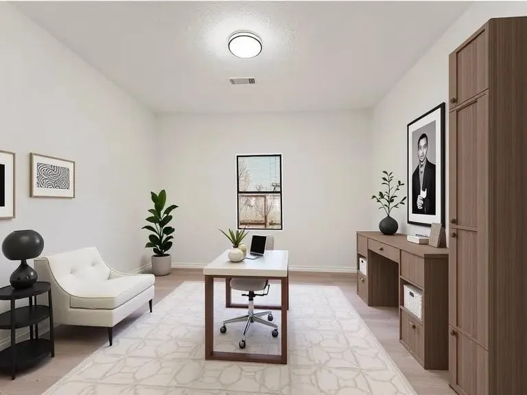 Office space featuring light wood-style flooring