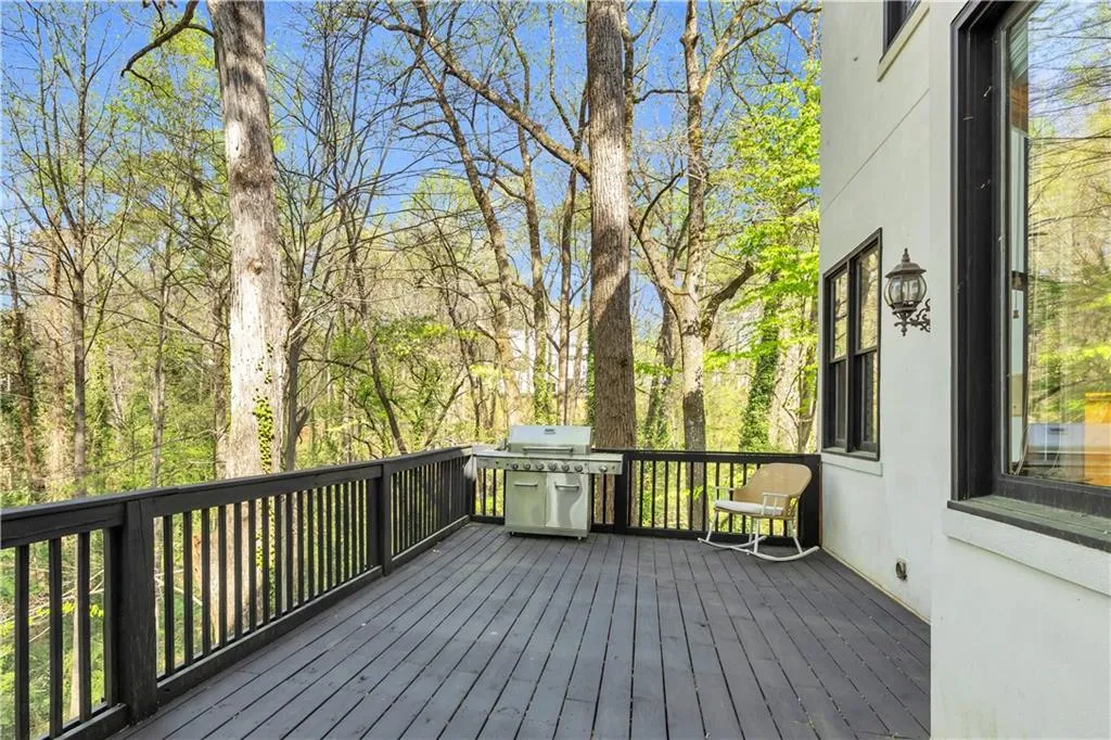 Deck featuring a grill