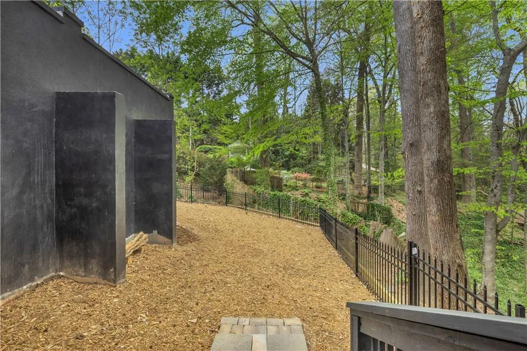 View of fenced backyard