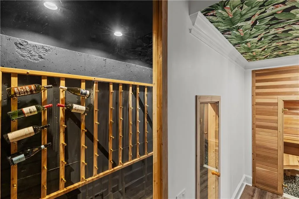 Wine cellar with a relaxing sauna and wood finished floors