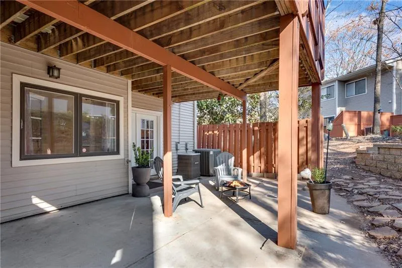 View from Private Patio to Fenced Corner.