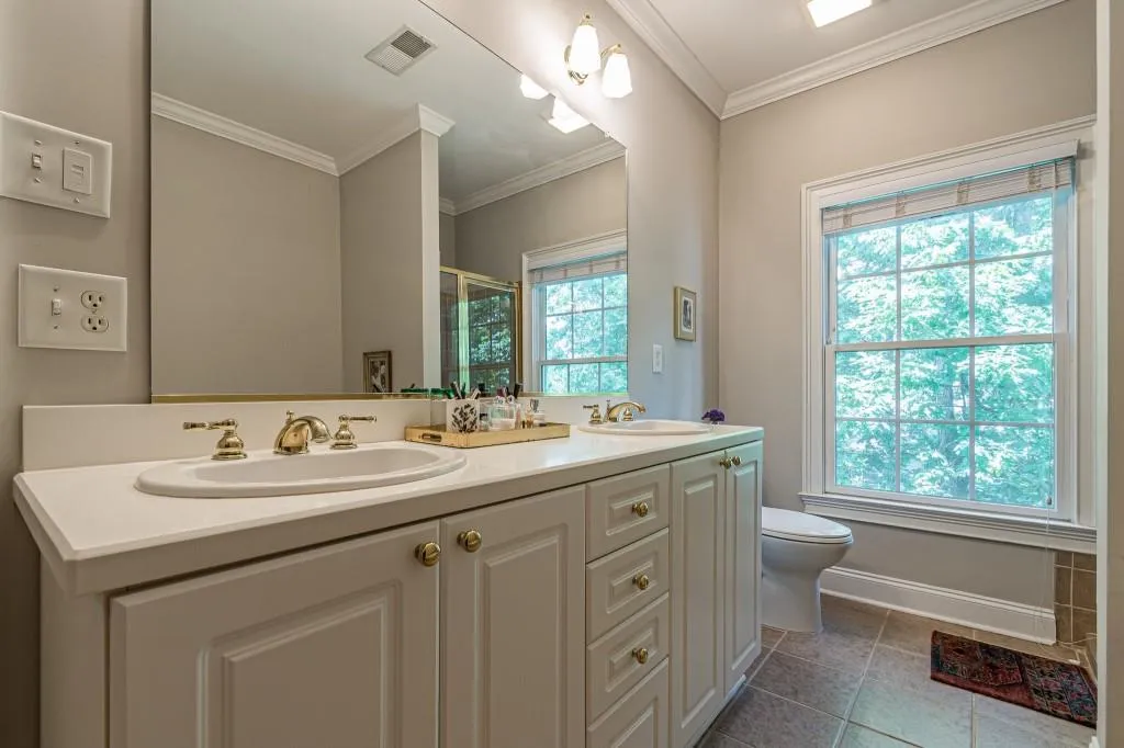 Double Vanity with classic fixtures - light and plumbing. Double Vanity with classic fixtures - light and plumbing.