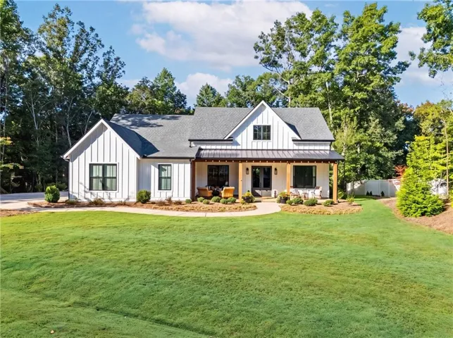 Modern farmhouse architecture with white board-and-batten siding