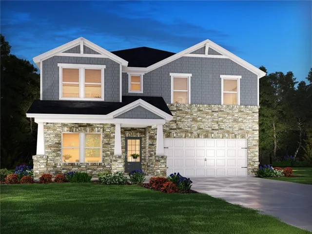 Two-story residence featuring a stone and shake siding exterior, covered entry porch with columns, a two-car garage, and landscaped front yard