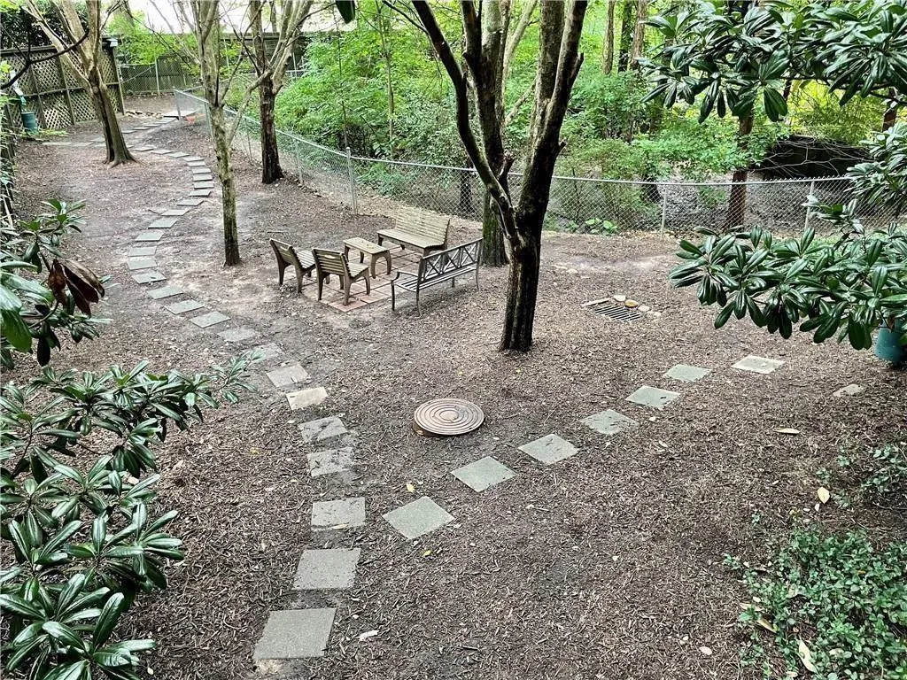 View of fenced backyard