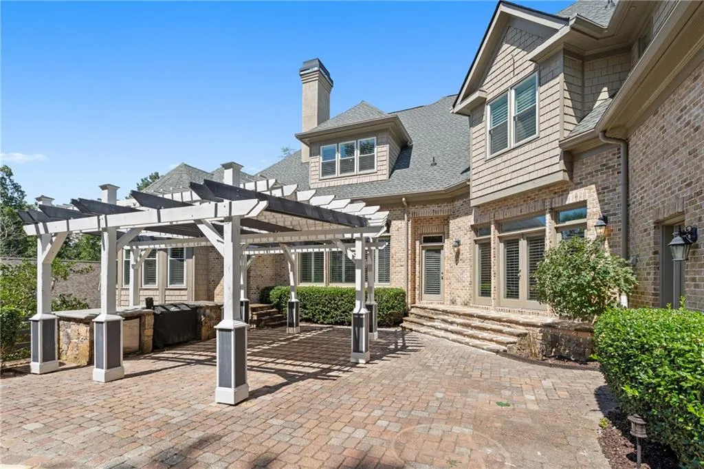 View of patio with a pergola