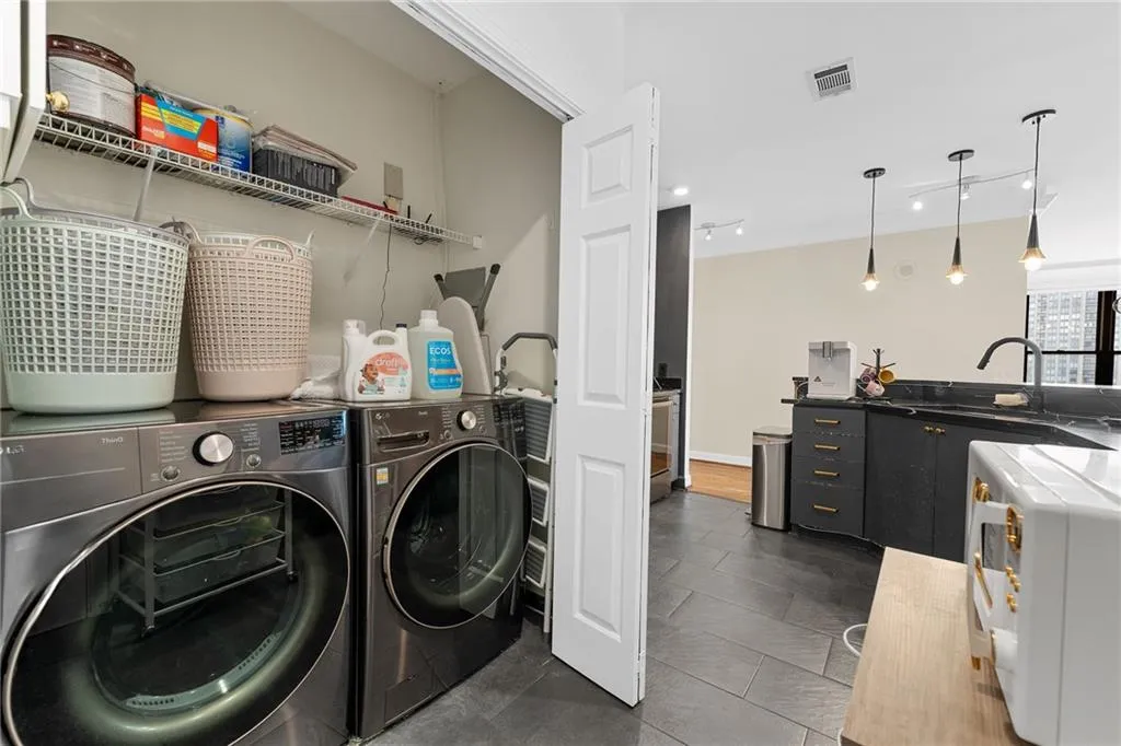 Compact laundry area with wire shelving
