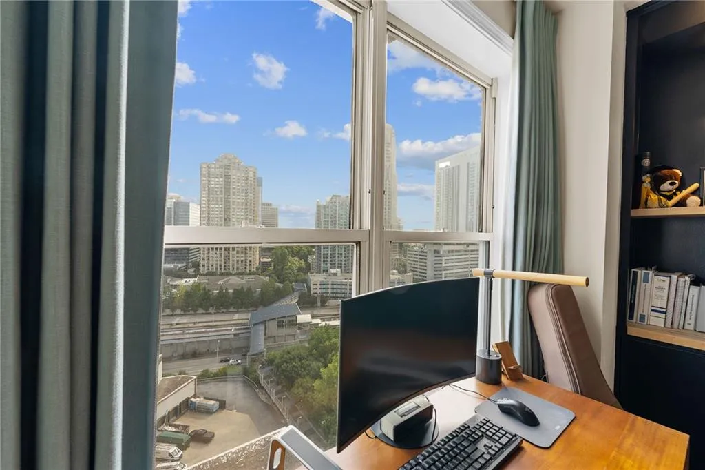 Expansive window offering city views
