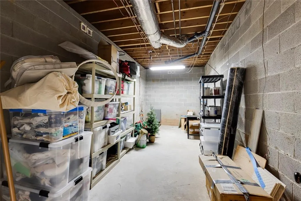 Storage space that could be great for gym, theater or golf simulator.