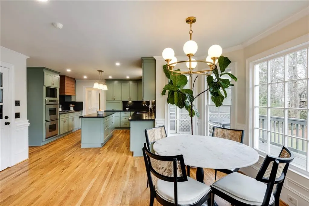 Bright breakfast area with designer lighting.