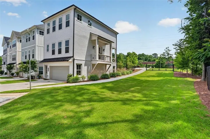 Coveted end unit with green space so much privacy