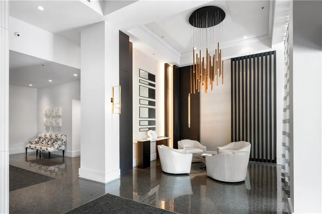 Concierge desk is flanked by a beautifully renovated lobby to each side.