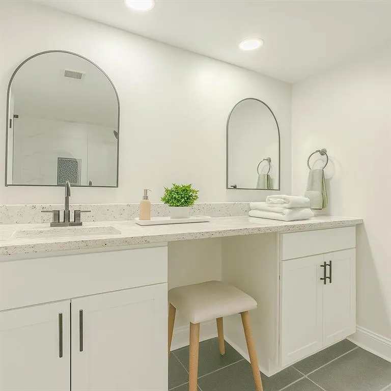 Bathroom featuring double vanity, recessed lighting, and tile patterned floors