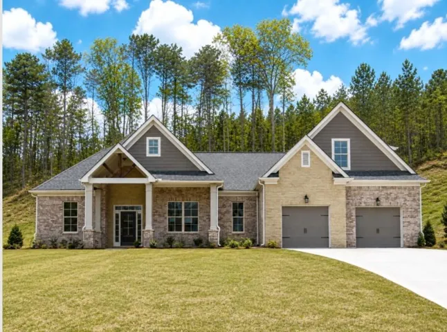 Stone and brick facade with gabled roof lines