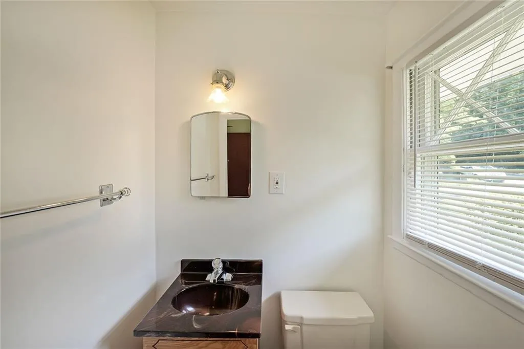 Bathroom featuring toilet and vanity