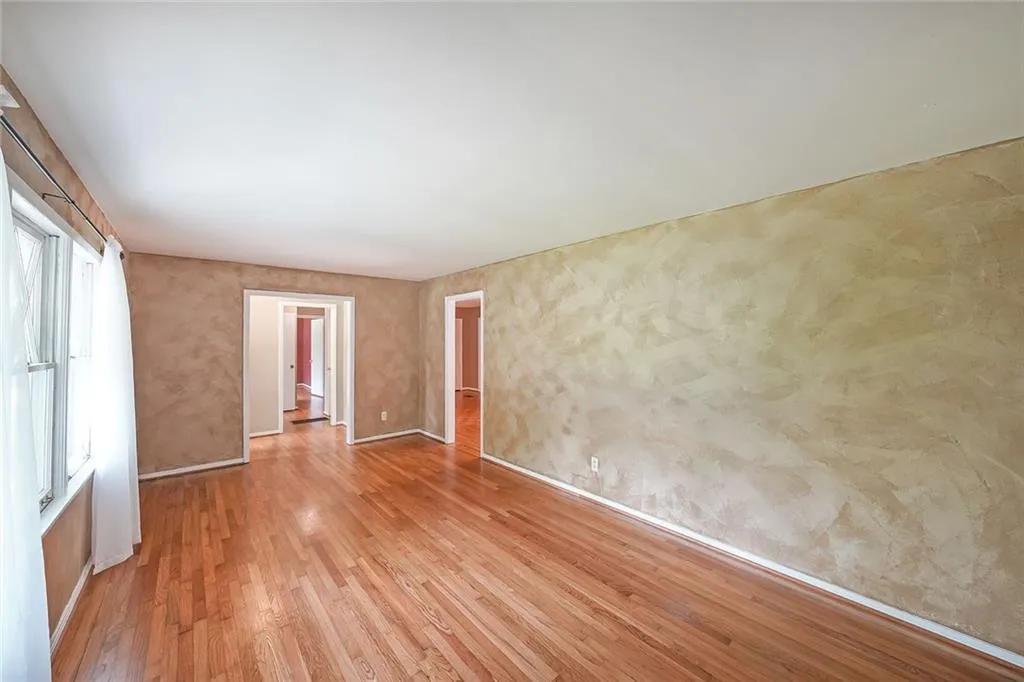 Spare room featuring light wood finished floors