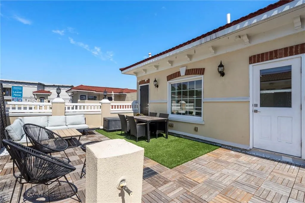 View of patio / terrace featuring outdoor lounge area, a roof deck, and outdoor dining space View of patio / terrace featuring outdoor lounge area, a roof deck, and outdoor dining space