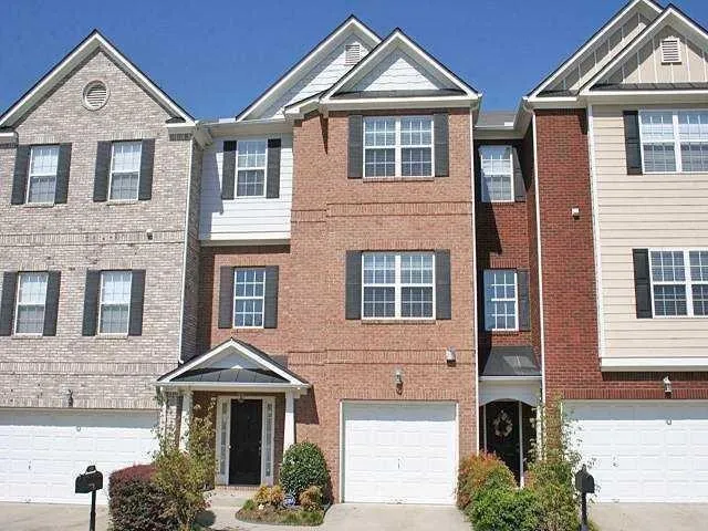 Brick and siding exterior with gabled roof lines