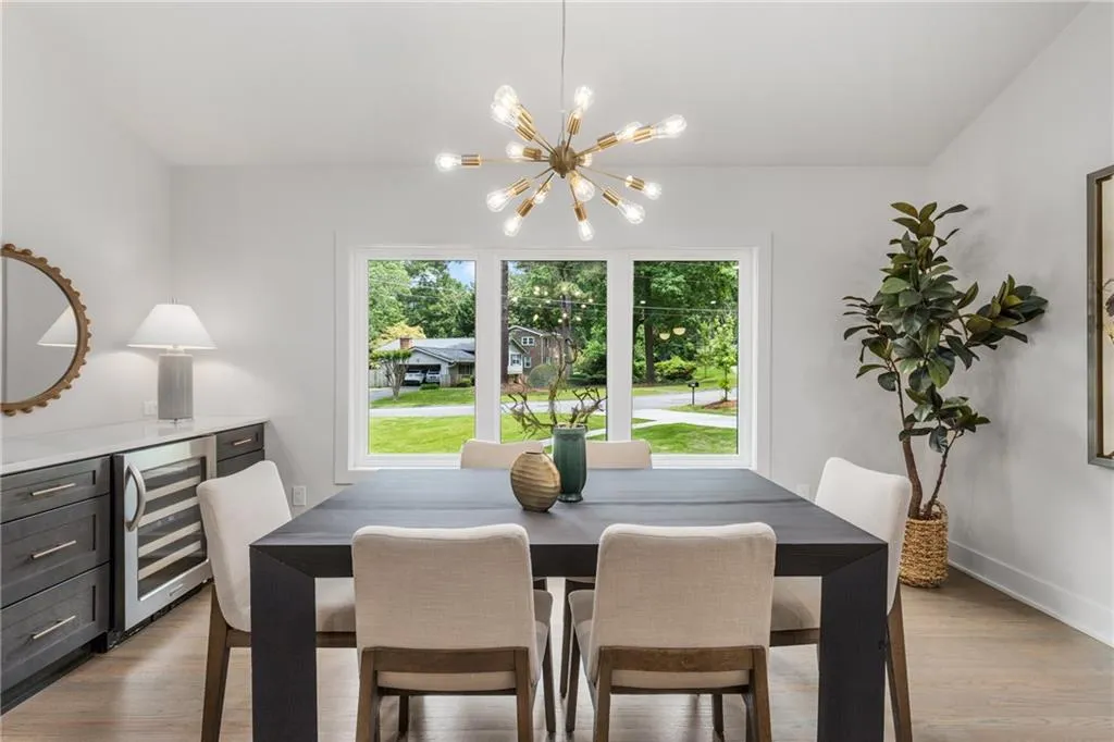 The wall-to-wall windows really lighten this dining area! The wall-to-wall windows really lighten this dining area!