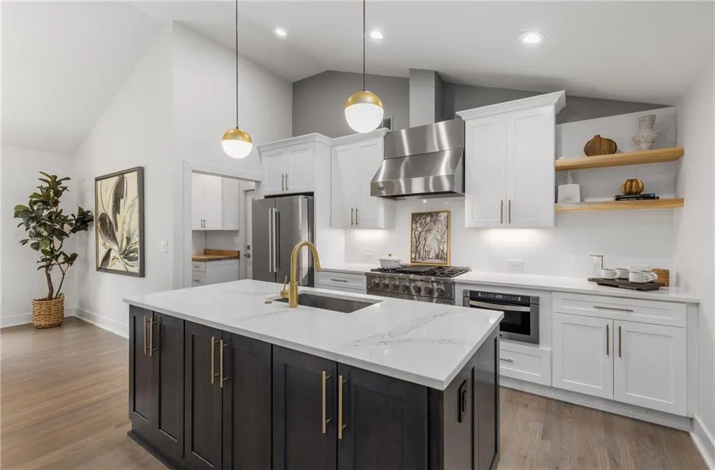 The home chef will love the soft-close cabinetry, 5-burner gas range, large single basin sink and plenty of prep space! The home chef will love the soft-close cabinetry, 5-burner gas range, large single basin sink and plenty of prep space!