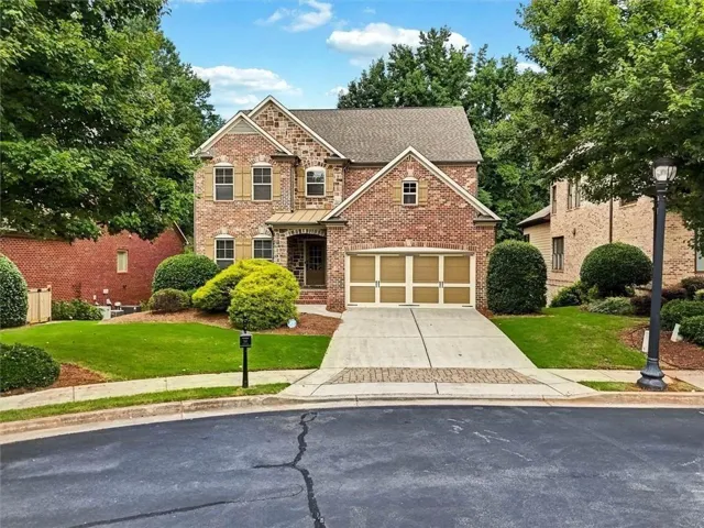 3-Sides Brick w Stone ascent. Gated Community. Come see this home today.