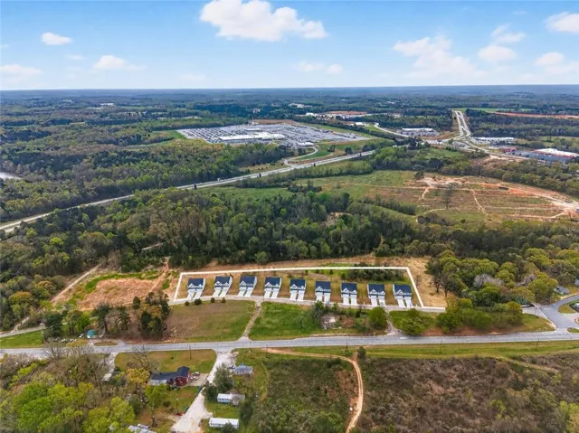 Newly constructed residences featuring contemporary designs and individual driveways