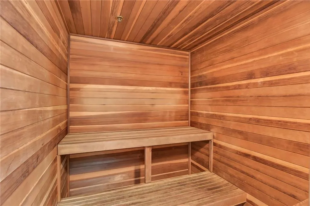 Sauna with wooden walls and wood ceiling