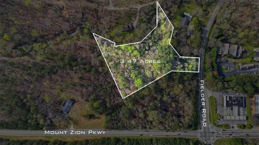Aerial Property Diagram. Depicting the boundaries and acreage of the property, including surrounding roads and structures