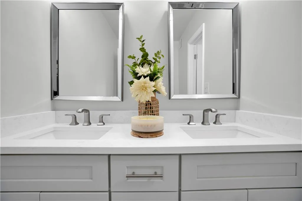 Bathroom featuring double vanity