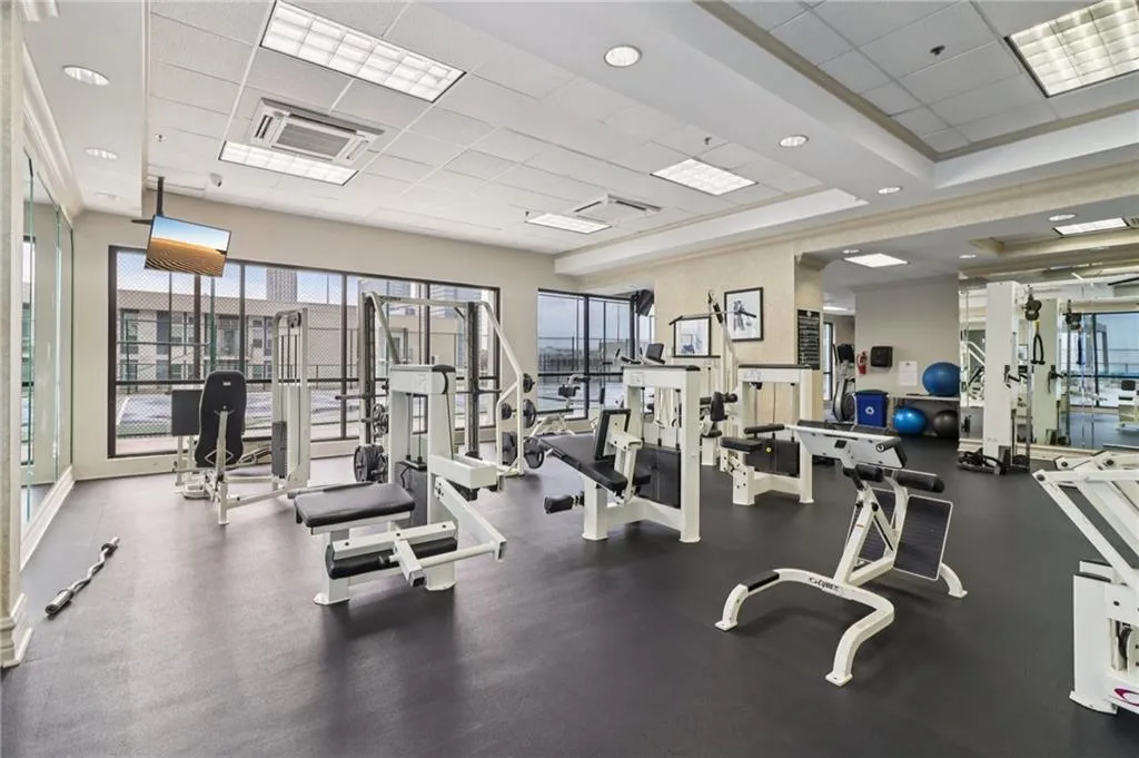 Workout area with a paneled ceiling
