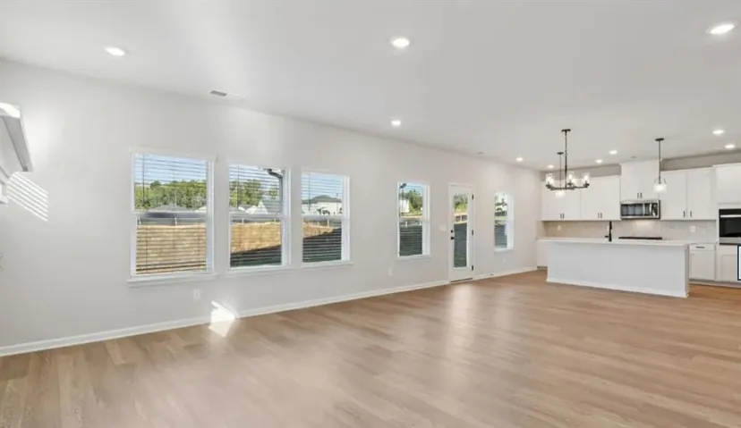 Open concept living room to kitchen.