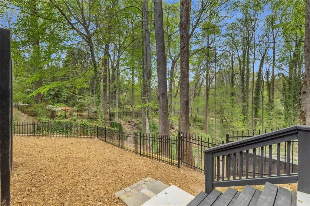 View of fenced backyard