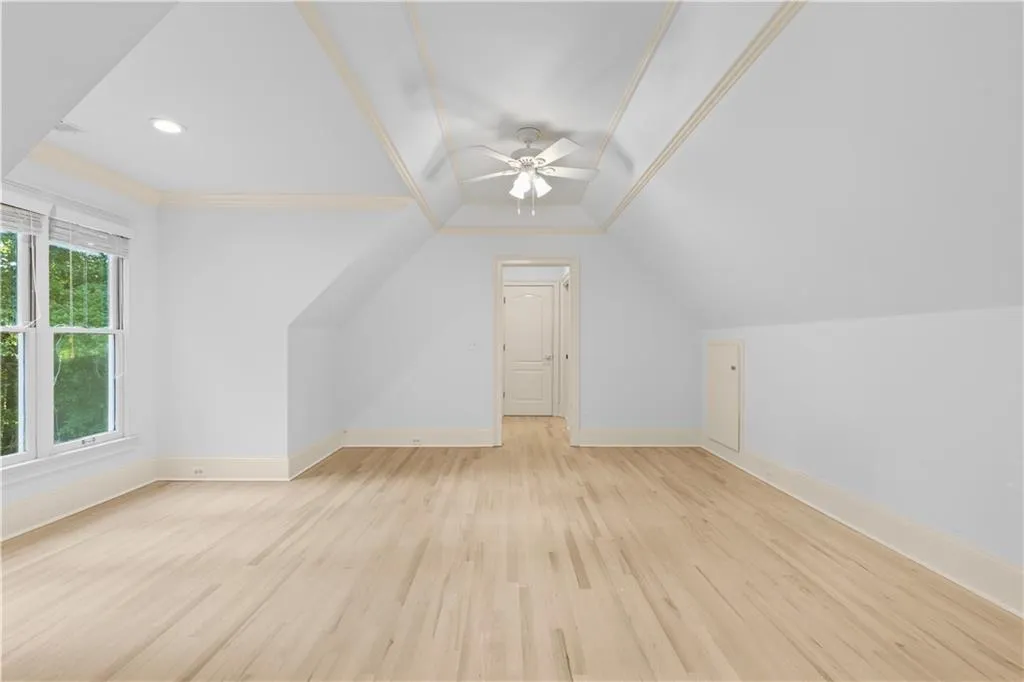 Bonus room with light wood-style flooring, a ceiling fan, and recessed lighting