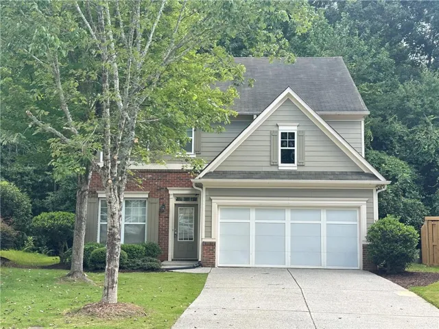 Brick and siding exterior with gabled roofline