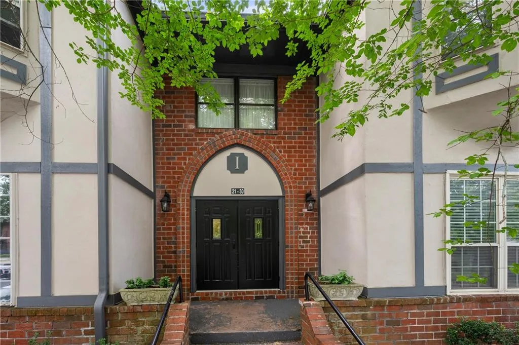 Property entrance featuring french doors