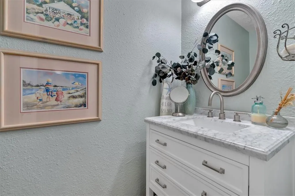 Half Bathroom on first floor featuring custom vanity