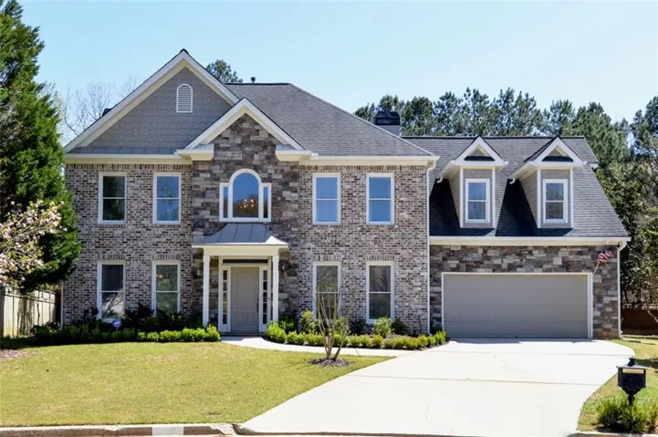 Renovated light filled home on cul-de-sac.