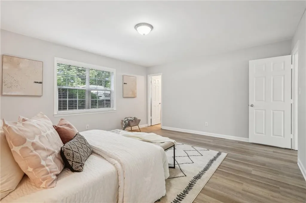 Bedroom with light wood-type flooring