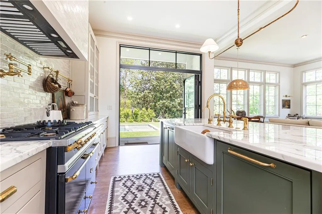 Open iron doors to patio and backyard