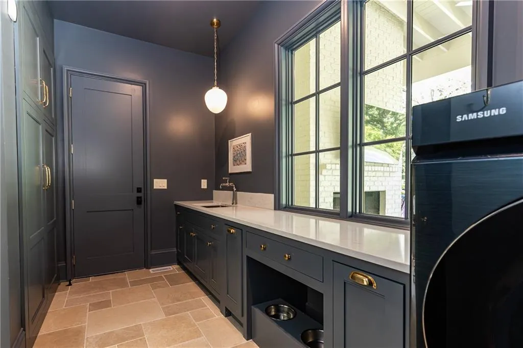 Laundry room and Dog wash Station door to single garage