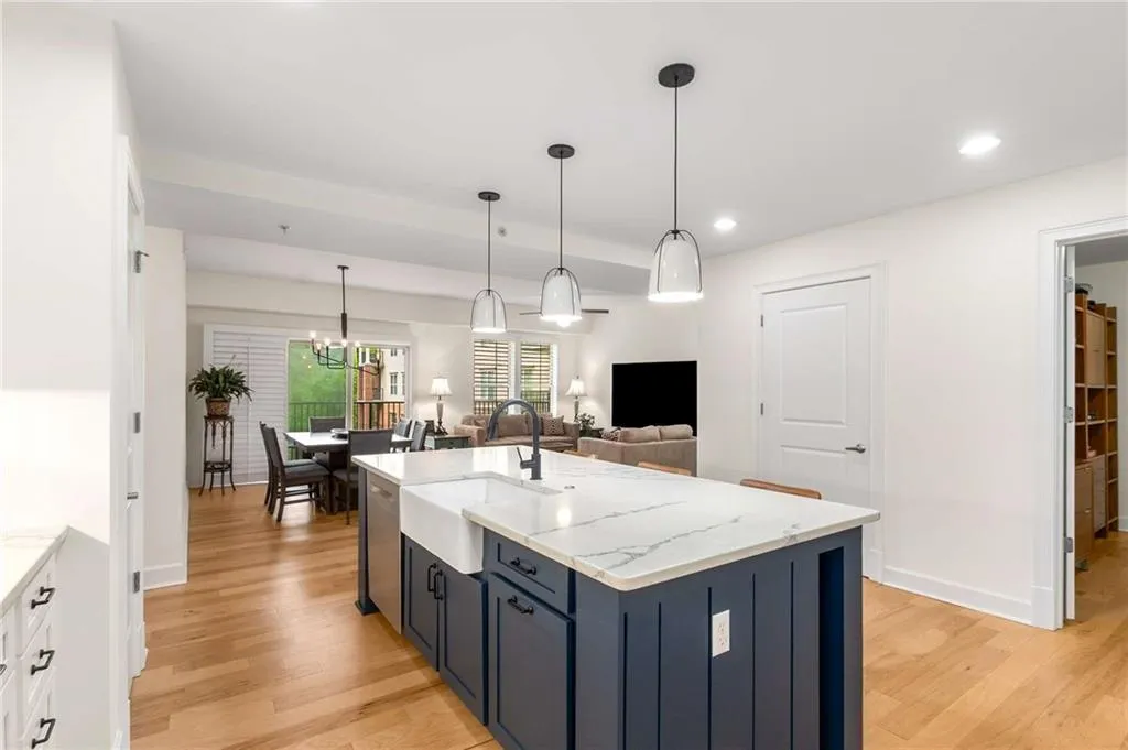 Ample storage and all stainless steel appliances are included.