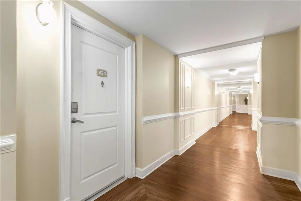 Gleaming hallways are always spotlessly clean.  Unit has 2 covered and deeded parking spaces not a far walk from your front door.