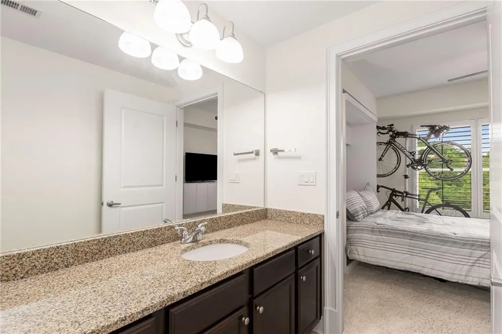 Secondary bath also allows for lots of counter space and has a large walk in closet.